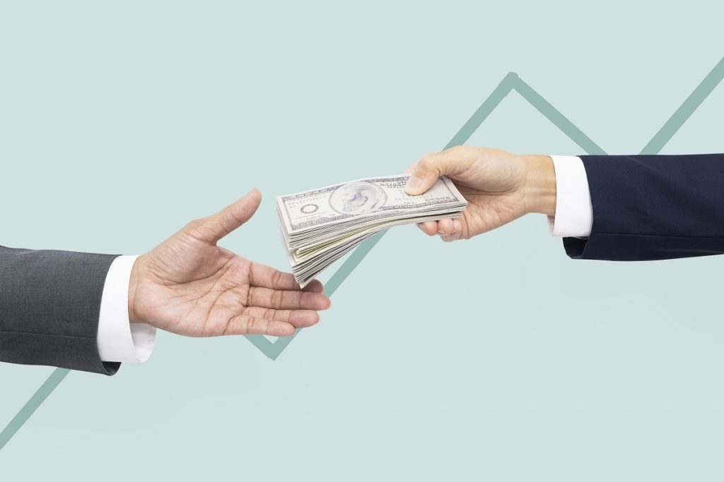 business proposal purchase hands holding money - Bizmedia.kz